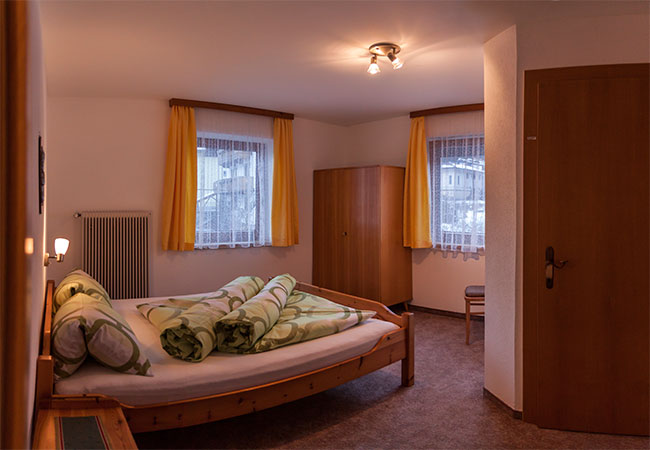 lechner-gerlossteinblick-schlafzimmer