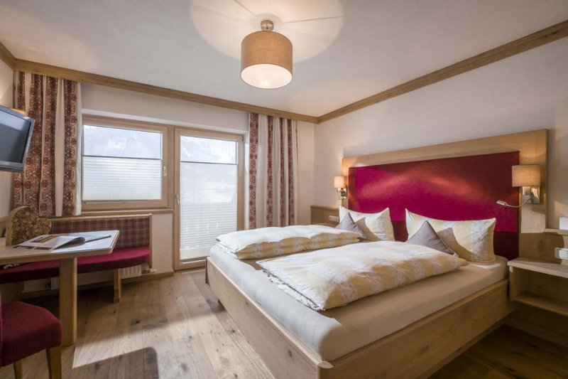ferienhof-auerhof-walchsee-ferienwohnung-typd-schlafzimmer